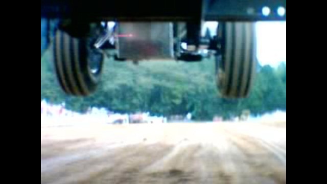 picture of under a pulling tractor marty chandler deeply hooked showing frame and chassis flex